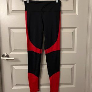 Alala 7/8 Captain Tights in in Black and Red. Size Small.